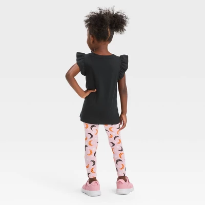 Toddler Girls' Moon 'Glow In The Dark' Short Sleeve Top & Leggings Set - Cat & Jack™ Black 1 Toddler Girls' Moon 'Glow In The Dark' Short Sleeve Top & Leggings Set - Cat & Jack™ Black